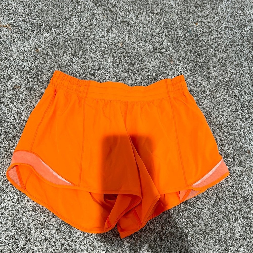 Bright orange Lulu hotty hot shorts